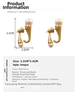 Detail view of gold-plated pearl earrings showing size 3.5cm by 2.0cm and product weight
