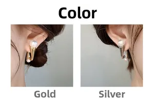 Detail showing J-shaped gold and silver pearl earrings worn on a model in side view
