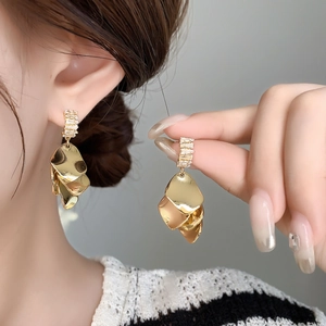 Layered gold shell petal earrings with sparkling cubic zirconia studs for women
