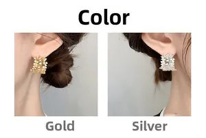 Close-up of rectangular pavé earrings in gold and silver finish on models