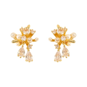 Elegant gold flower stud earrings with white pearls and sparkling teardrop crystals