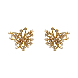 Elegant gold butterfly earrings with white pearls and sparkling cubic zirconia crystals