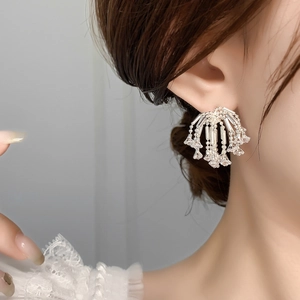 Elegant silver zircon tassel earrings featuring a sparkling firework fringe design