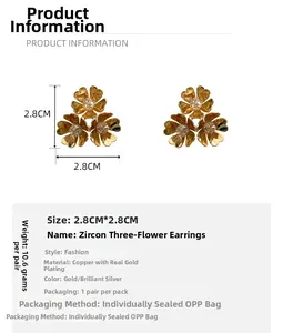 Detail view of gold floral C-shape earrings with zircon inlay, size 2.8cm by 2.8cm