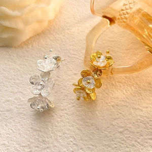 Elegant gold and silver floral drop earrings with sparkling zircon crystals