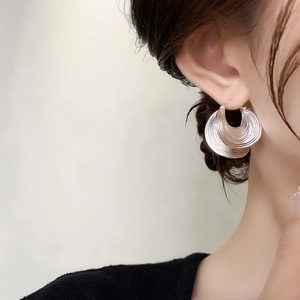 Vintage layered silver hoop earrings with unique textured leaf pattern for women