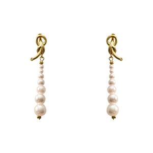 Boucles d'oreilles nœud français asymétriques avec perles blanches dégradées