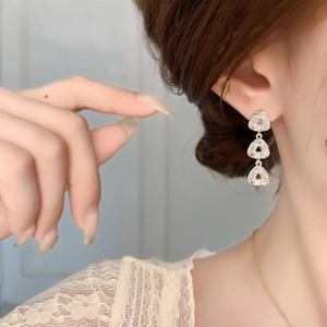 Elegant silver-plated triple triangle drop earrings with white cubic zirconia accents