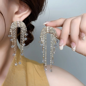 Elegant bridal tassel earrings with gold plating and zircon crystals for formal occasions