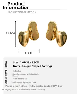 Detailed view of twisted irregular metal earrings showing 1.65x1.3cm size and 4.5g weight