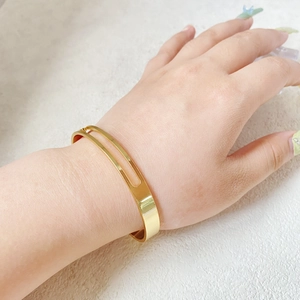 Minimalist gold-plated hollow cuff bracelet with geometric cutout for women