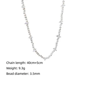 Detail of beaded pearl necklace with zircon star and 40cm plus 5cm extension chain