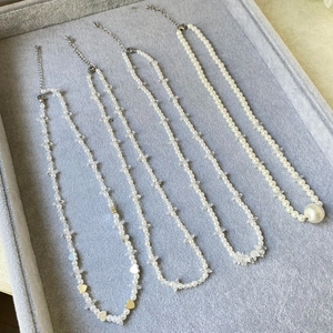 Baroque beaded zircon necklace featuring shell pearls and heart charms in diverse designs