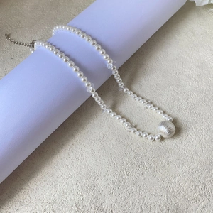 Baroque beaded pearl necklace with zircon accents and adjustable silver chain link