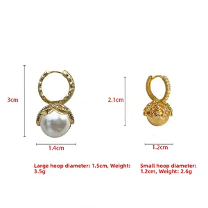 Detailansicht der goldene Perlenohrringe mit Größenangaben und Zirkonia Besatz im Vergleich