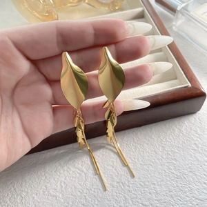 Golden wheat leaf tassel earrings with long chains and vintage leaf charm design
