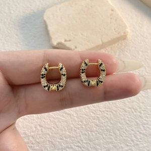 Luxury gold leopard print U-shaped earrings with micro-pave black and white zircons