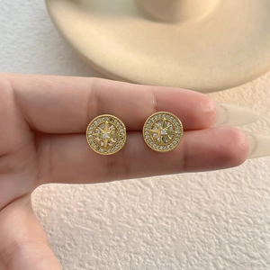 Elegant gold-plated eight-pointed star earrings with micro-pave cubic zirconia crystals