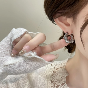Silver twisted woven texture hoop earrings with minimalist geometric design for women