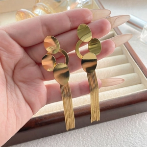 Elegant gold-plated long tassel earrings with geometric circular discs for women