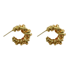 Vintage gold-plated chunky twisted spiral hoop earrings with polished geometric texture