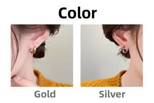 Detailed comparison of gold and silver geometric hoop earrings with faceted design