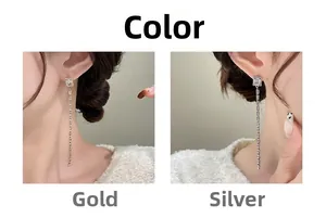 Comparaison détaillée de longues boucles d'oreilles à pompons en finitions or et argent
