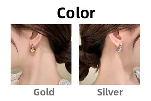 Detailed comparison of gold and silver C-shaped earrings with hammered texture finish