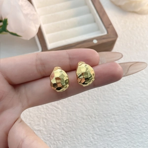 Minimalist 18K gold plated C-shaped drop earrings with hammered texture and irregular design