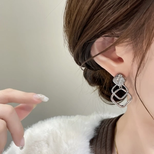 Silver geometric square drop earrings with textured finish and layered metal frames