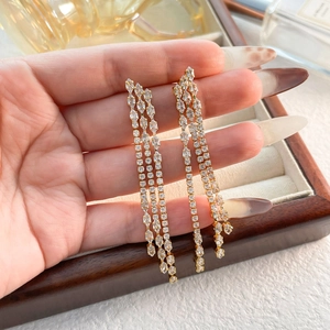 Elegant gold long fringe earrings with three rows of sparkling zircon tassels for women