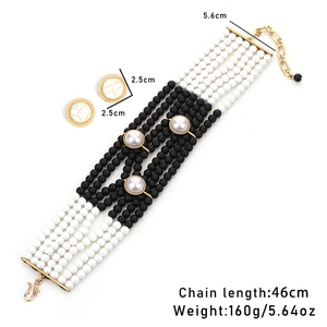 Retro handmade black and white beaded choker necklace with matching round stud earrings