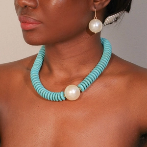Faux turquoise disc necklace with large pearl center and matching round pearl earrings