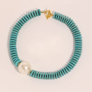 Blue turquoise disk bead necklace with large pearl and gold toggle clasp