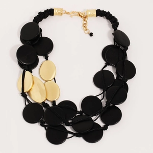 Bohemian multi-layer necklace with black matte discs and gold oval plates on woven rope