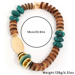 Bohemian handmade beaded wooden necklace with gold charms and green stones, 58cm length