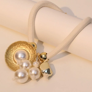 Elegant French vintage faux pearl necklace with matte gold pendant and braided cotton cord