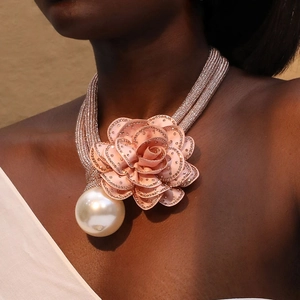 Elegant floral pearl necklace with layered pink mesh roses and crystal accents