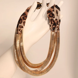 Multi-layer gold metal spiral neck collar with leopard print fabric statement design