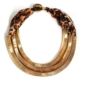 Three-layer gold metal statement necklace featuring leopard print fabric accents