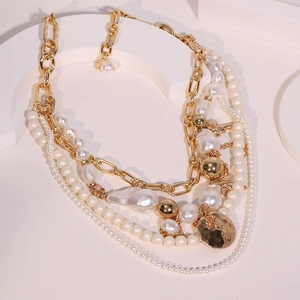 Elegant multilayered beaded choker with gold metal chains and baroque pearls