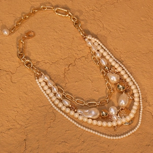 Elegant multi-layer gold chain necklace with white imitation pearls and round pendants