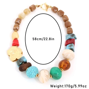Multicolor resin beaded necklace with gold flower detail and length measurement