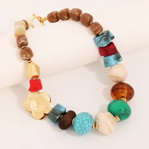Exaggerated resin beaded necklace with marble texture beads and golden flower pendant