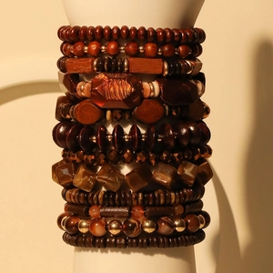 Bohemian multi-layer wooden beaded bracelet set with acrylic charms on white display