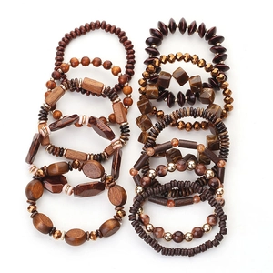 Set of 12 bohemian handmade beaded bracelets with wooden and acrylic charms in retro brown