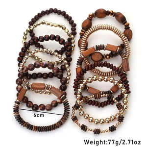 Set of 11 bohemian wood bead bracelets in brown and gold with 6cm inner diameter
