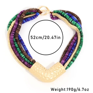 Detail view of multi-layer beaded necklace with V-shaped metal tube and size labels