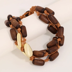 Bohemian multilayer wood bead necklace with polished gold metal accents and woven cord