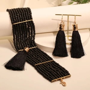 Bohemian multilayer black bead necklace and fringe earring jewelry set on display